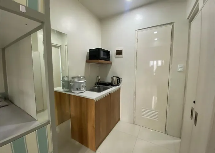 Uhome Lacson アパートホテル